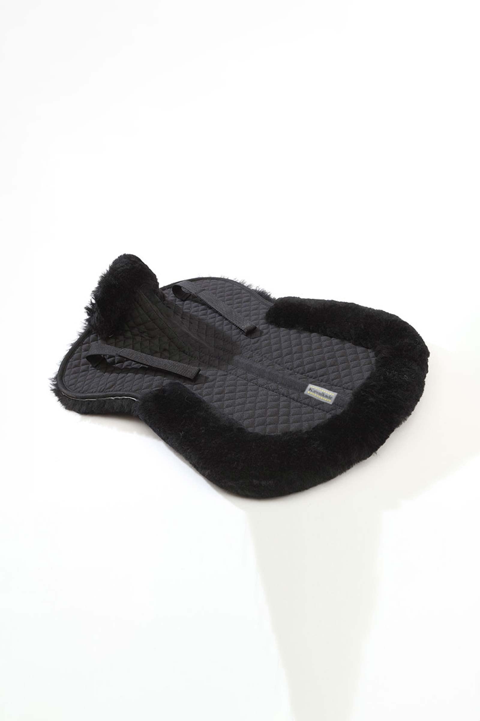 Kavalkade Lambswool pad w/ brim behind, lambswool Saddle Pads