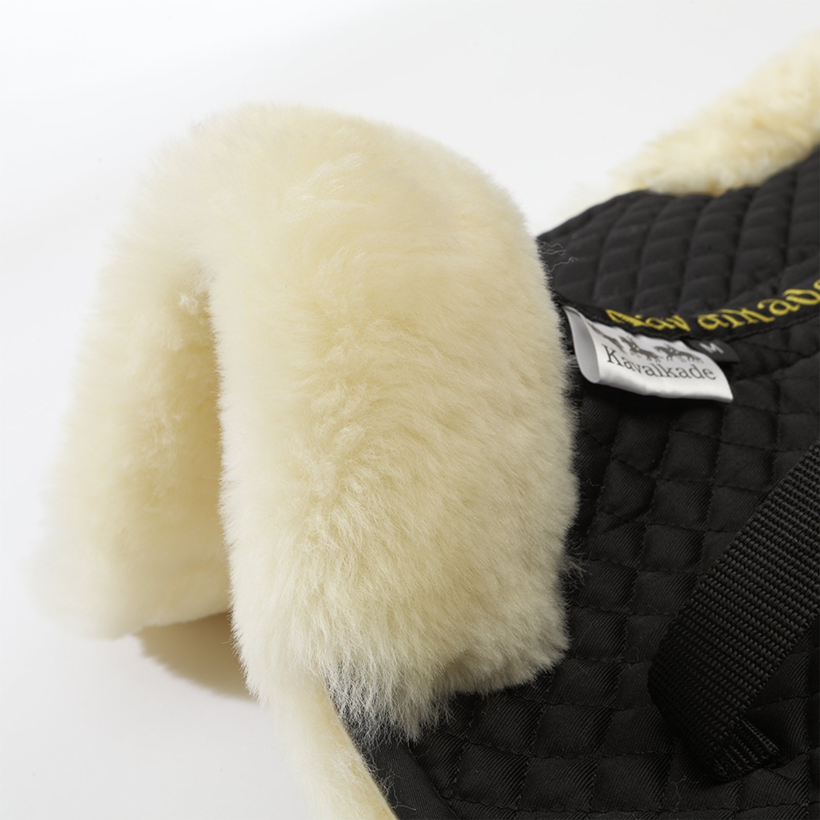 Kavalkade Lambswool pad w/ brim behind, lambswool Saddle Pads